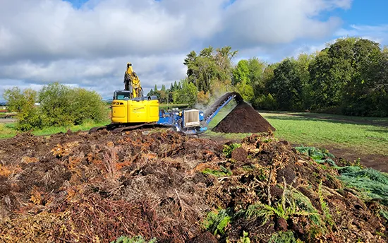 Nexterra Inc's equipment grinding nursery green waste